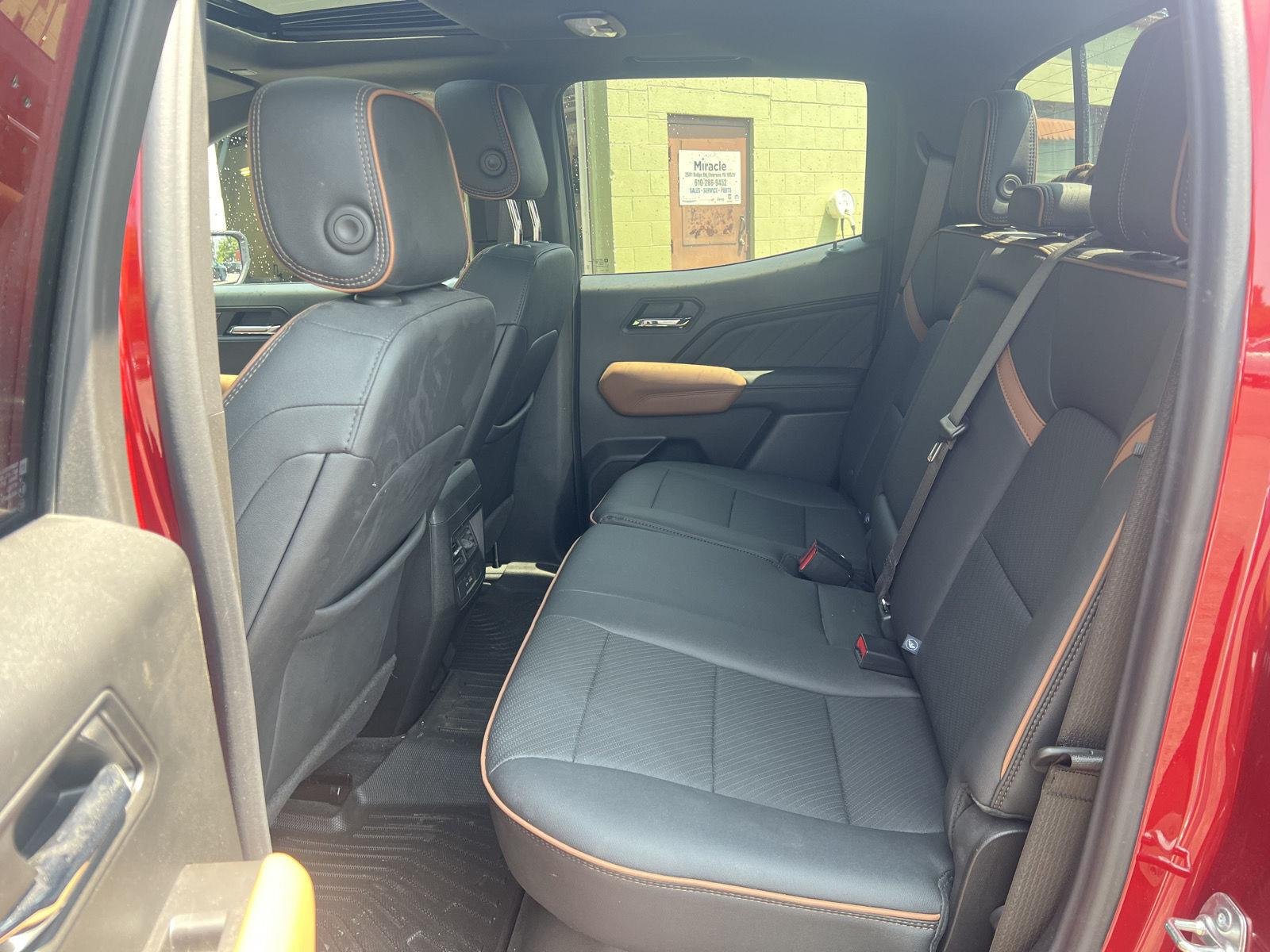 Used 2024 Volcanic Red Tintcoat GMC 4WD AT4 image 14