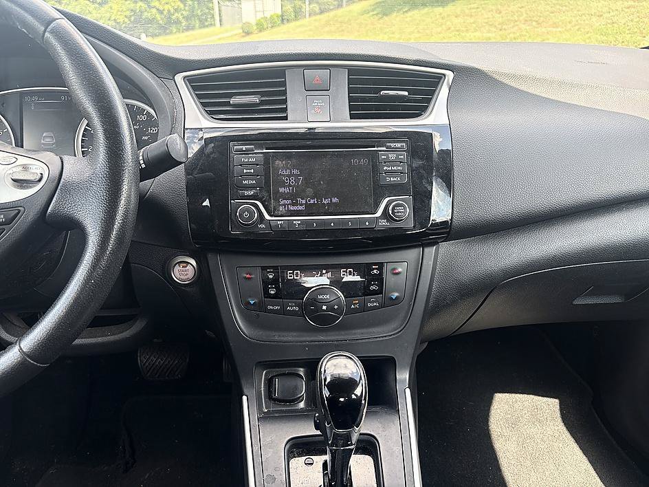 Used 2018 Super Black Nissan SV image 16