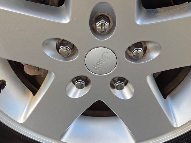 Used 2013 Beige Jeep Sport image 19