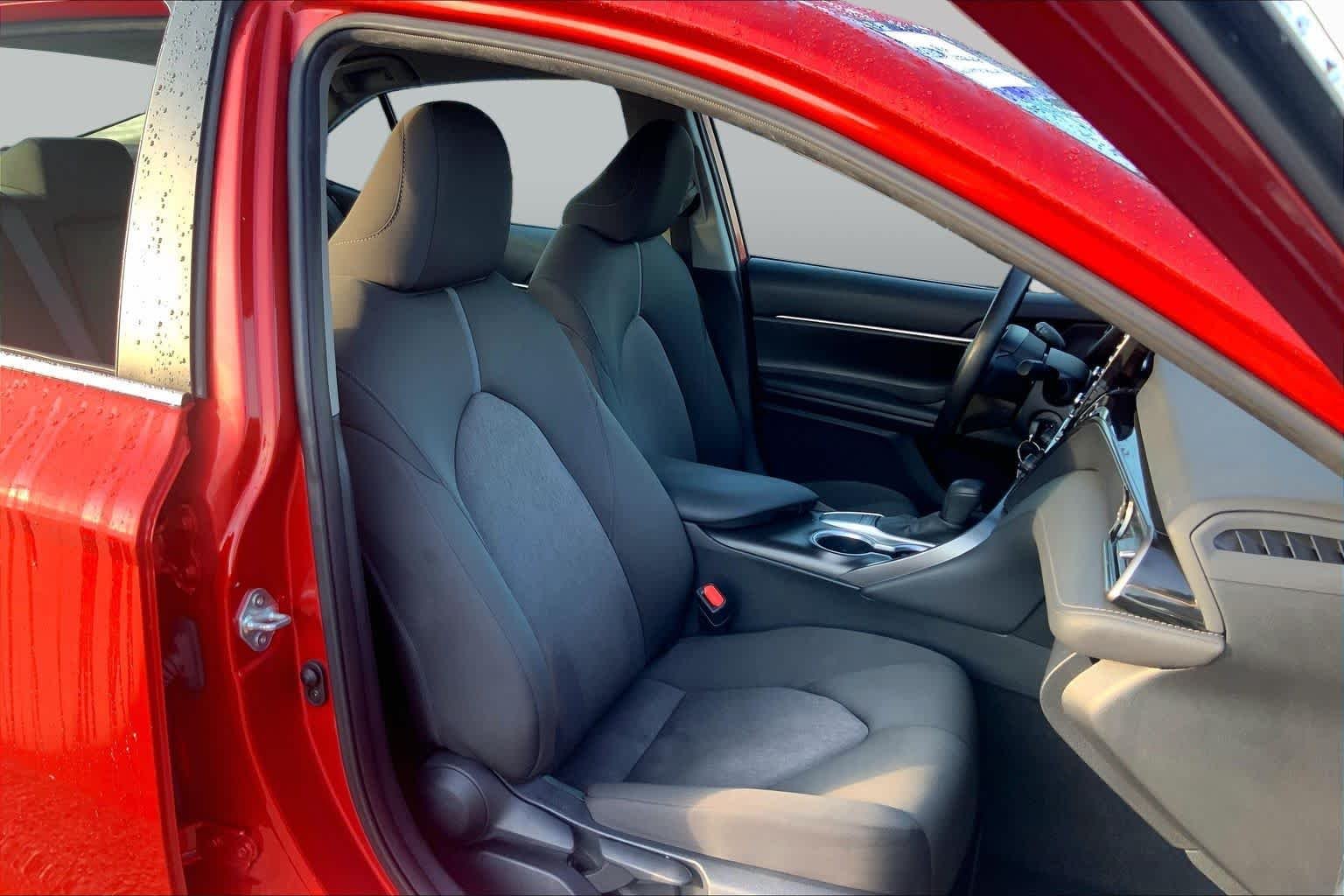 Used 2024 Supersonic Red Toyota LE image 9