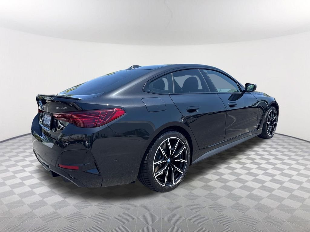 Used 2025 Black Sapphire Metallic BMW eDrive40 image 4