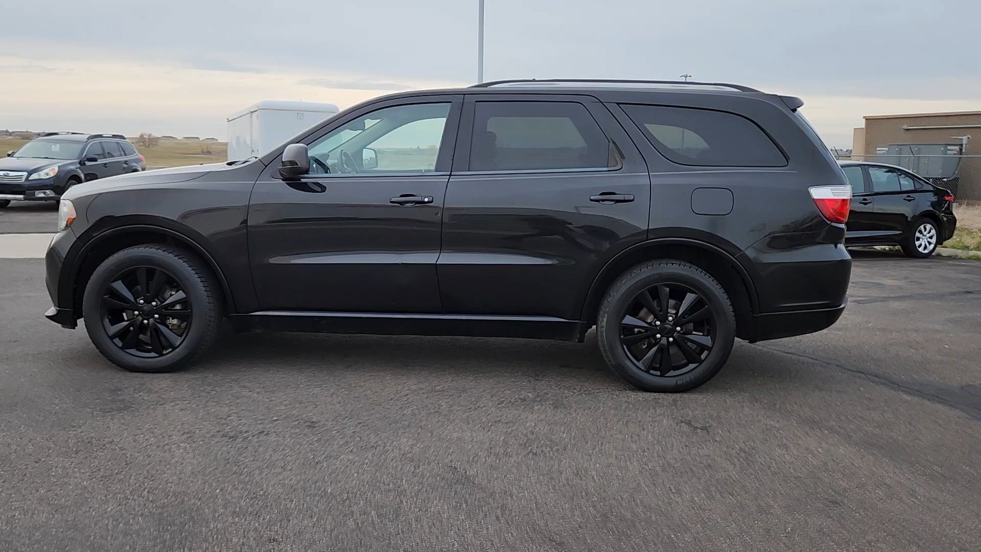 Used 2013 Dodge Durango SXT with VIN 1C4RDJAG1DC677592 for sale in Cheyenne, WY