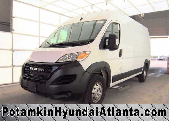 Used 2023 Bright White Clearcoat Ram High Roof image 1