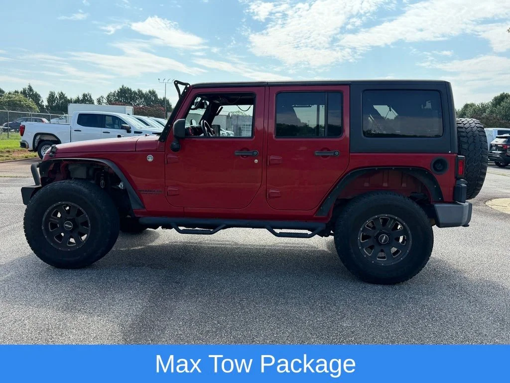 Used 2014 Red Jeep Unlimited Sport image 10