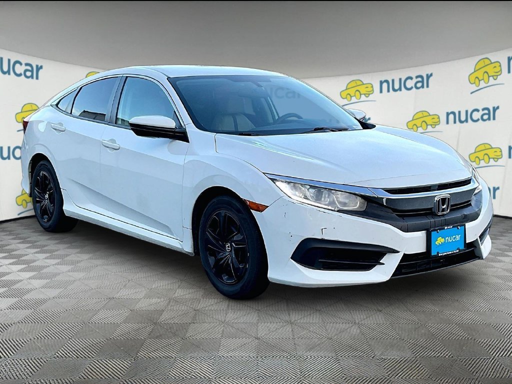 Used 2016 White Orchid Pearl Honda LX image 1