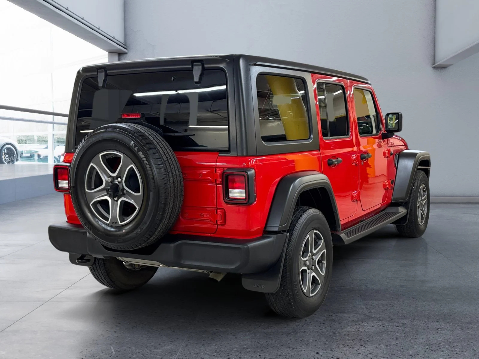 Used 2021 Firecracker Red C/C Jeep Unlimited Sport image 5