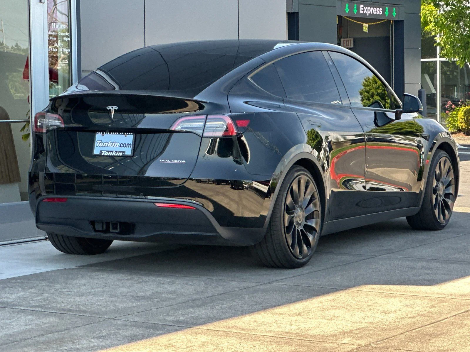 Used 2022 Solid Black Tesla Performance image 3