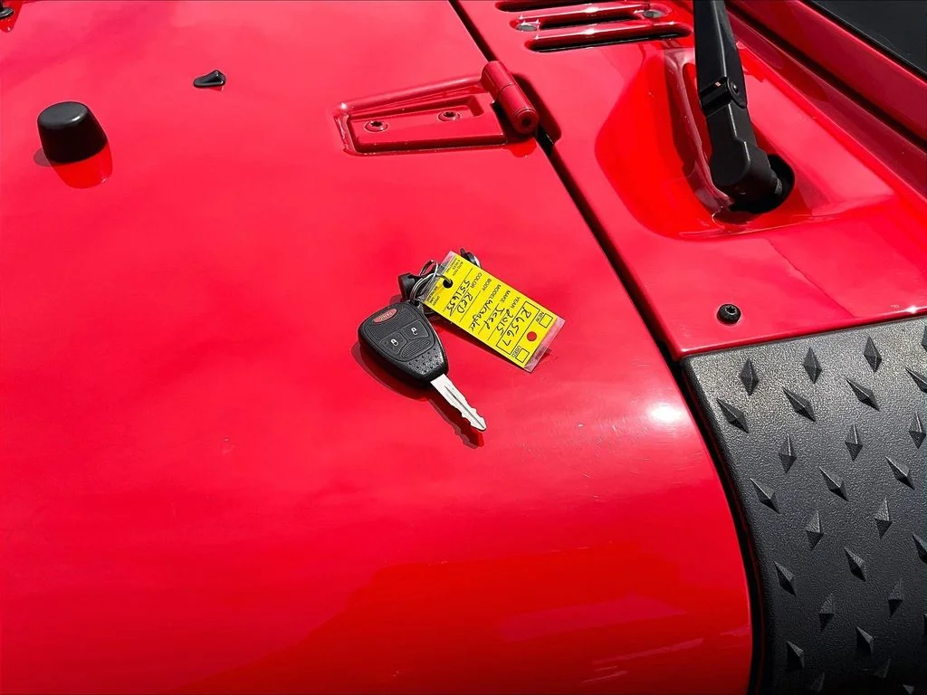 Used 2015 Red Jeep Unlimited Sport image 9