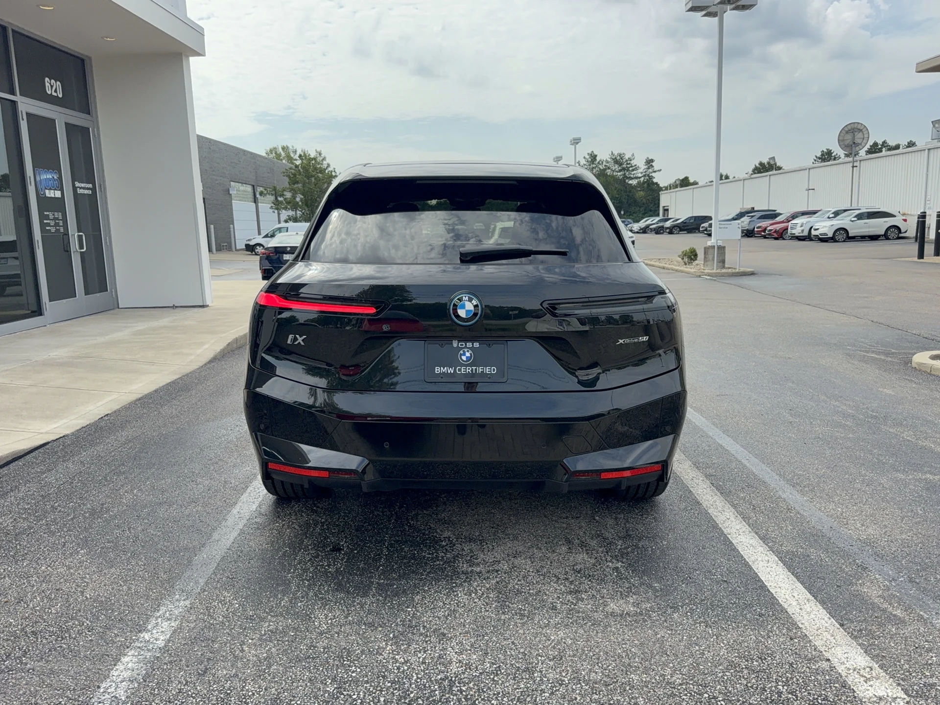 Certified Used 2024 Black Sapphire Metallic BMW xDrive50 image 4