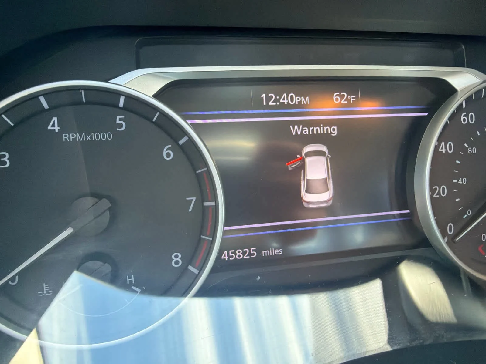 Used 2025 Electric Blue Metallic Nissan SV image 12