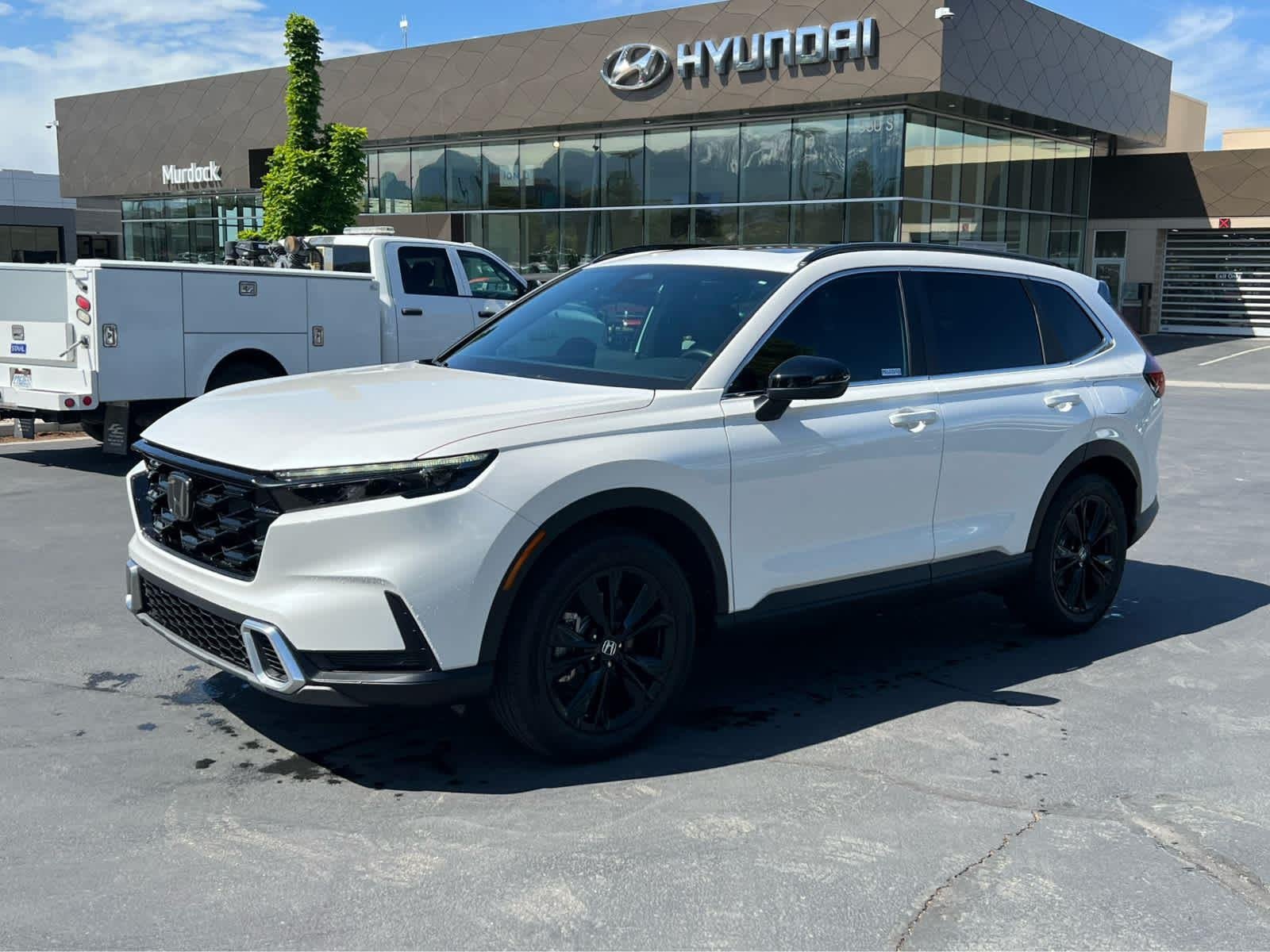 2025 Honda CR-V Hybrid Sport Touring AWD's photo