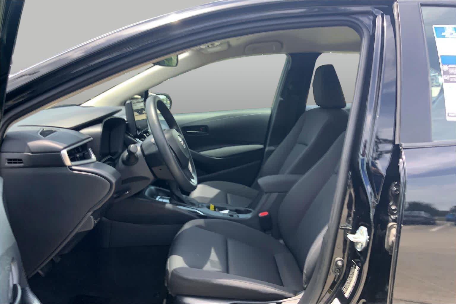 Used 2024 Midnight Black Metallic Toyota LE image 8