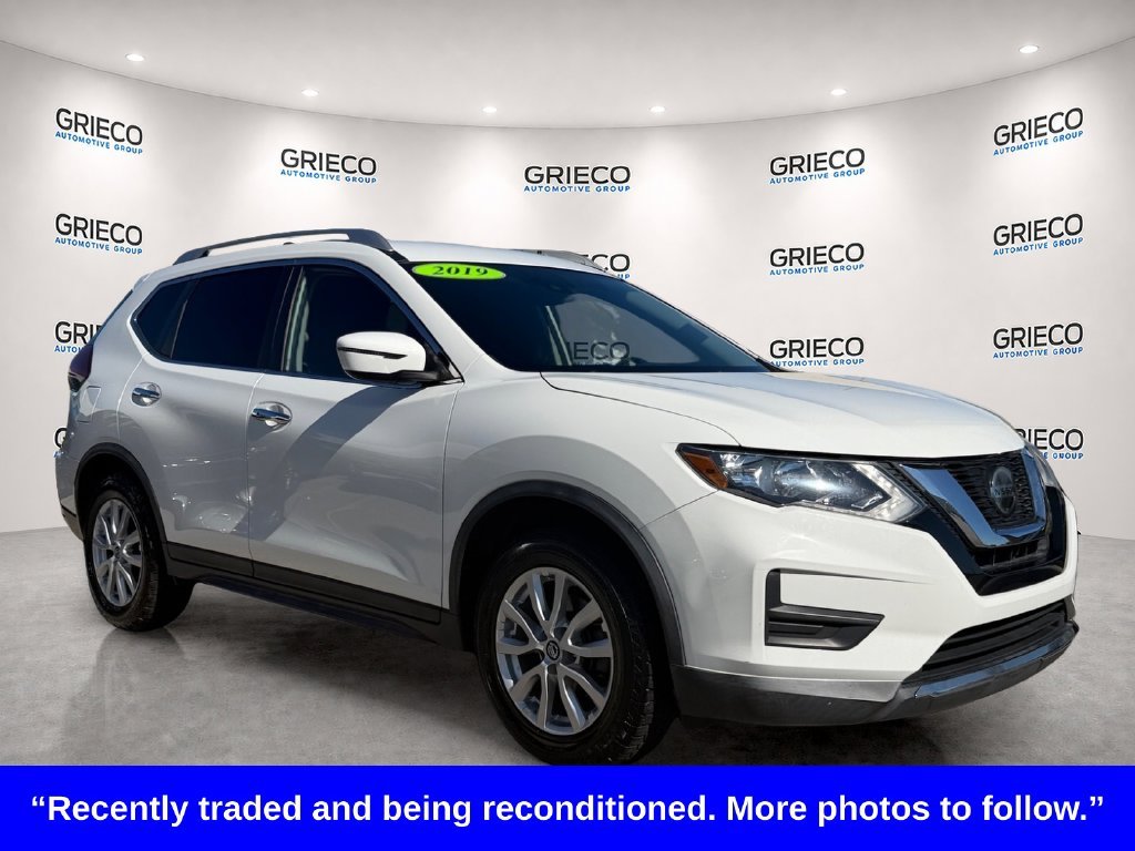 Used 2019 White Nissan SV image 1