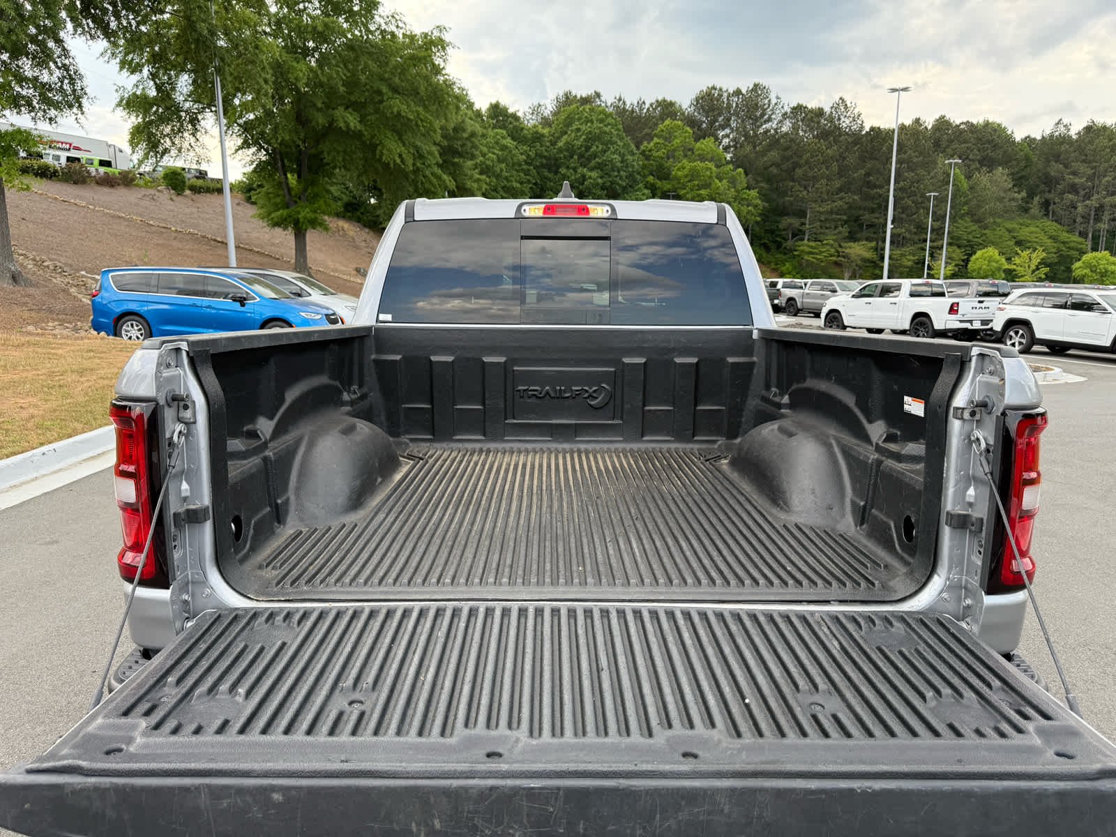 Used 2025 Billet Silver Metallic Clearcoat Ram Rebel image 26