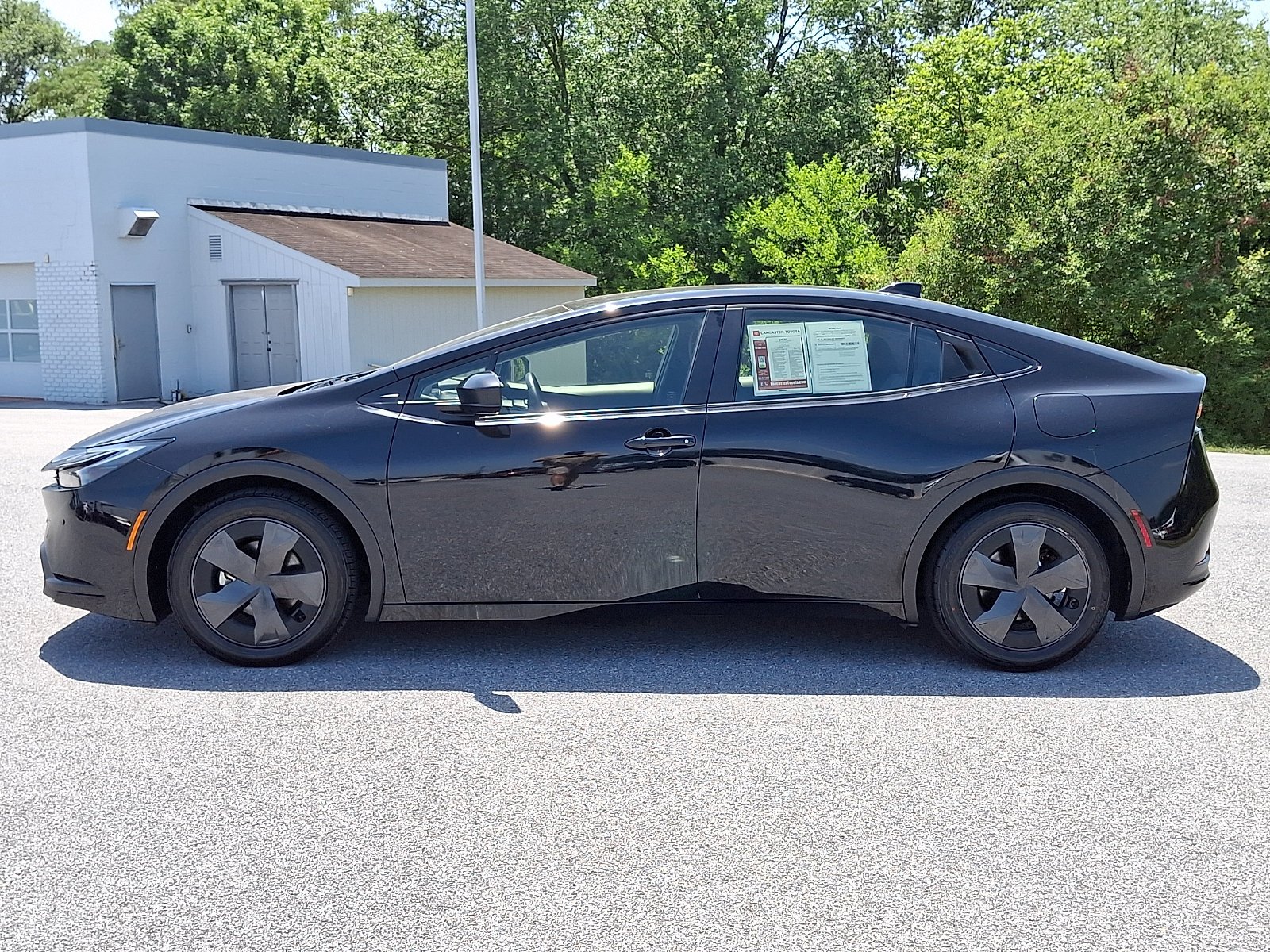 Used 2025 Midnight Black Metallic Toyota LE image 4