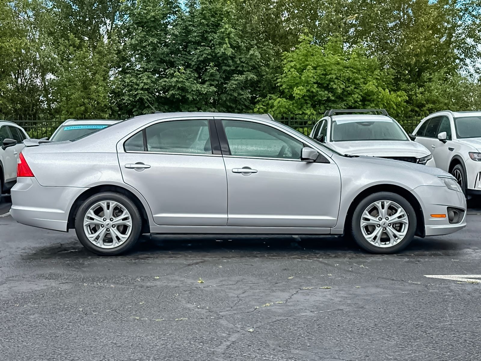 Used 2012 Ford Fusion SE with VIN 3FAHP0HA6CR117040 for sale in Eugene, OR