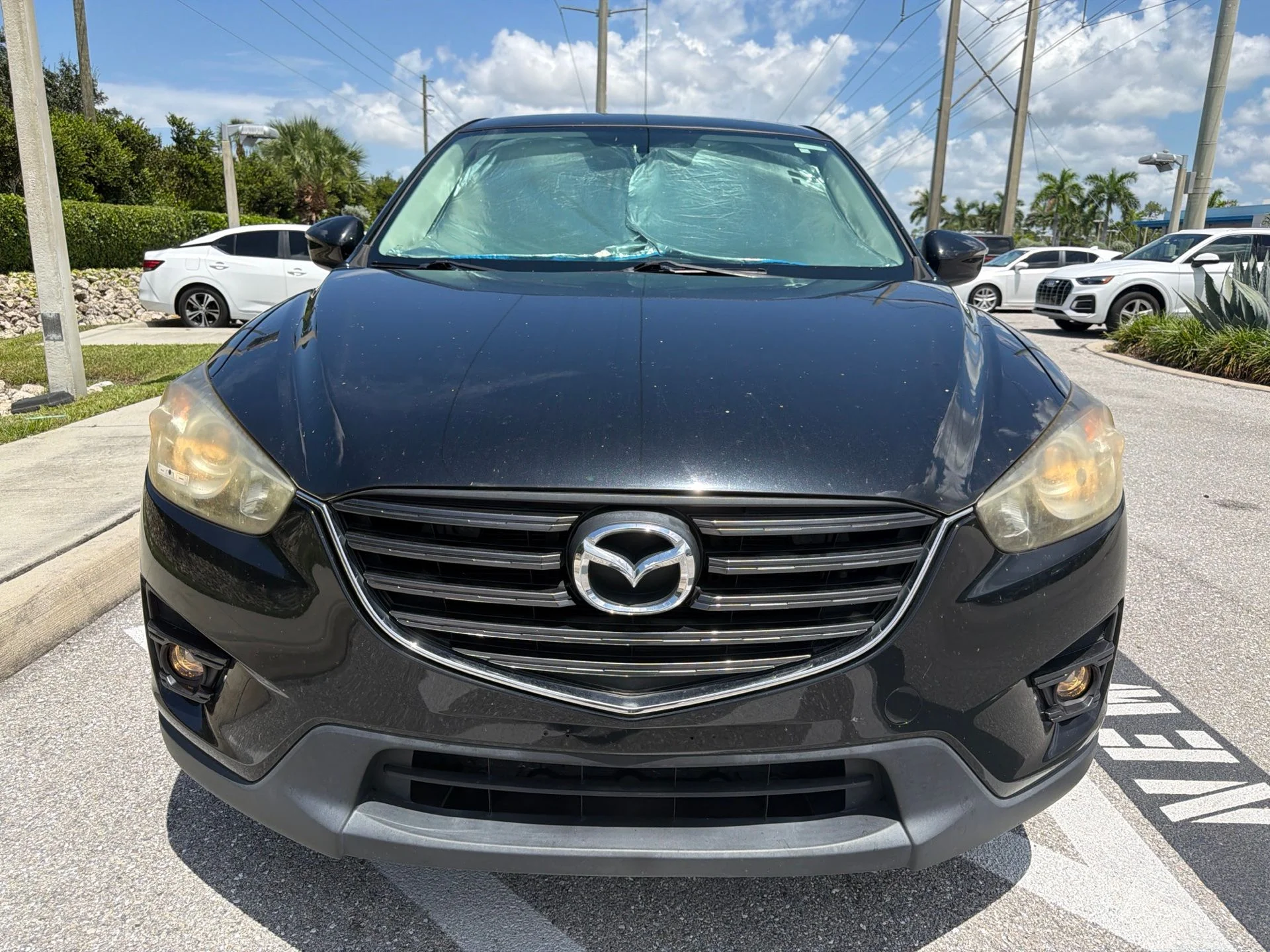 Used 2016 Mazda CX-5 Touring with VIN JM3KE2CY7G0638383 for sale in Naples, FL