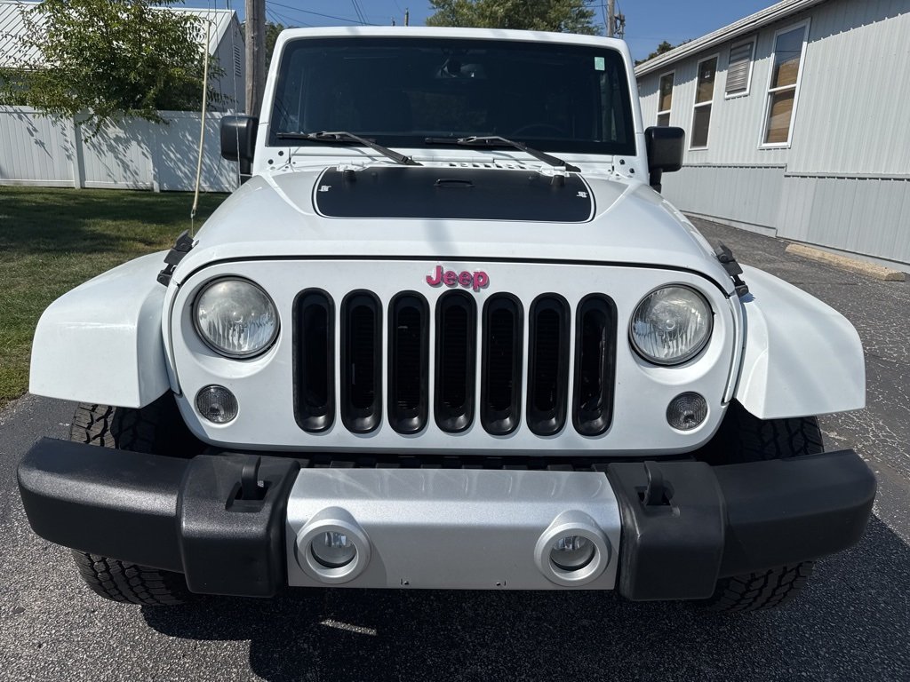 Used 2015 Jeep Wrangler Unlimited Sahara with VIN 1C4HJWEG7FL500382 for sale in Middlebury, IN