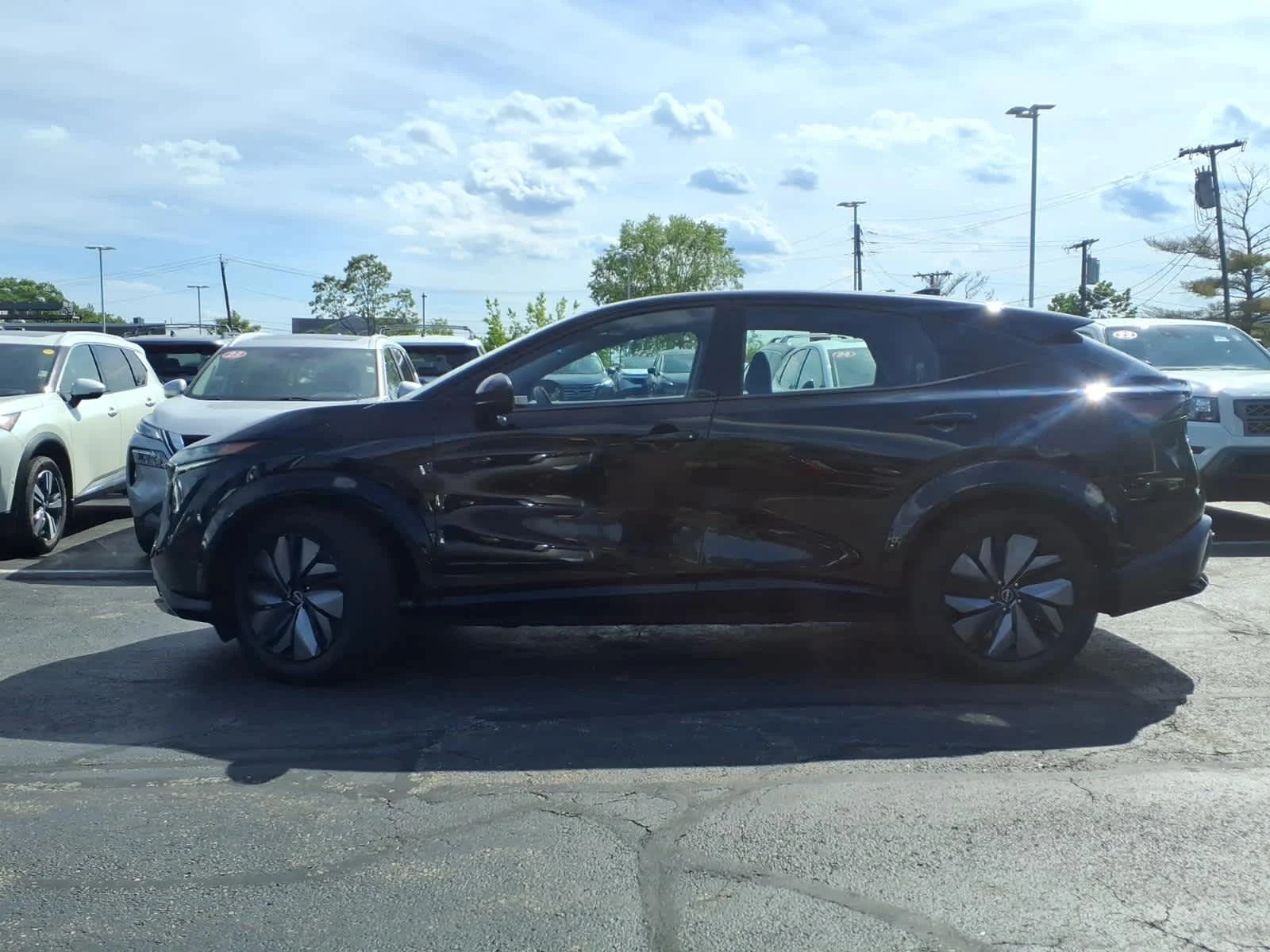 Certified Used 2024 Black Diamond Pearl Nissan EVOLVE+ image 8