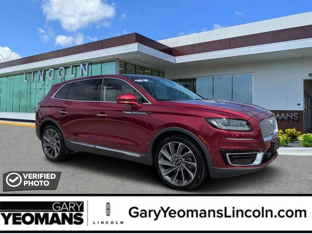 Used 2019 Ruby Red Metallic Lincoln Reserve image 1