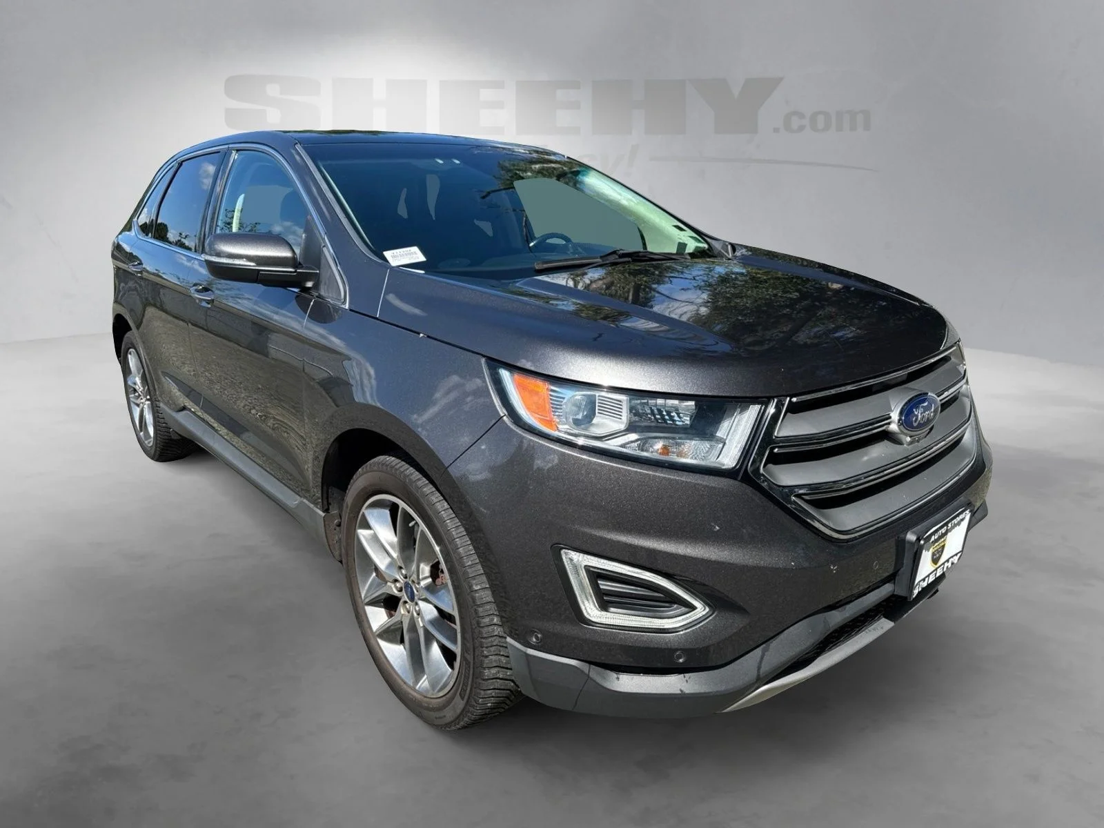 Used 2016 Magnetic Metallic Ford Titanium image 3
