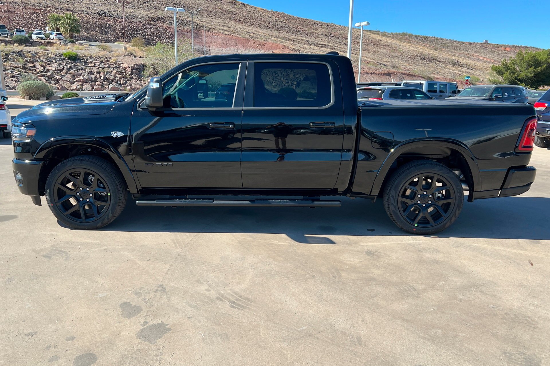 New 2026 Diamond Black Crystal Pearl-Coat Exterior Paint RAM Laramie image 2