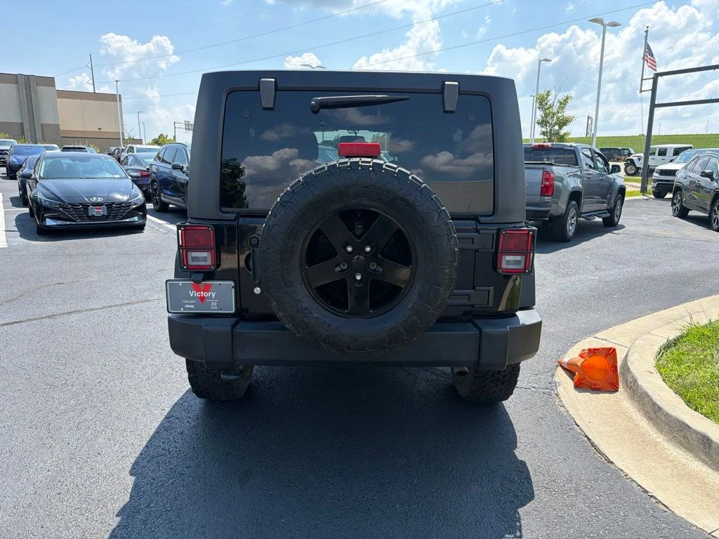 Used 2018 Black Jeep Unlimited Sport image 6