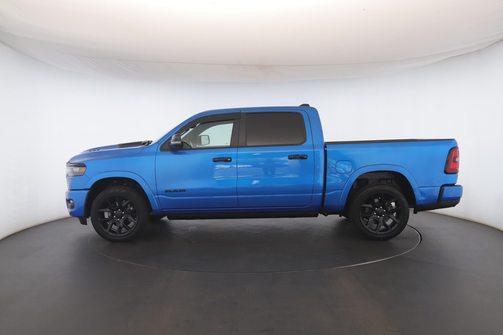 Used 2025 Hydro Blue Pearlcoat Ram Laramie 4x4 Crew Cab 5