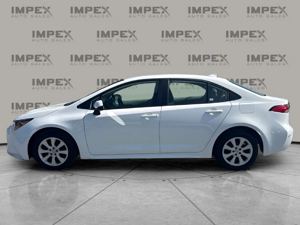 Used 2025 White Toyota LE image 2
