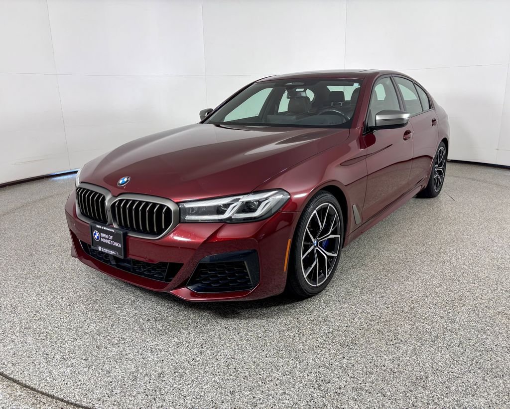 Used 2021 Aventurin Red Metallic BMW M550i xDrive image 1