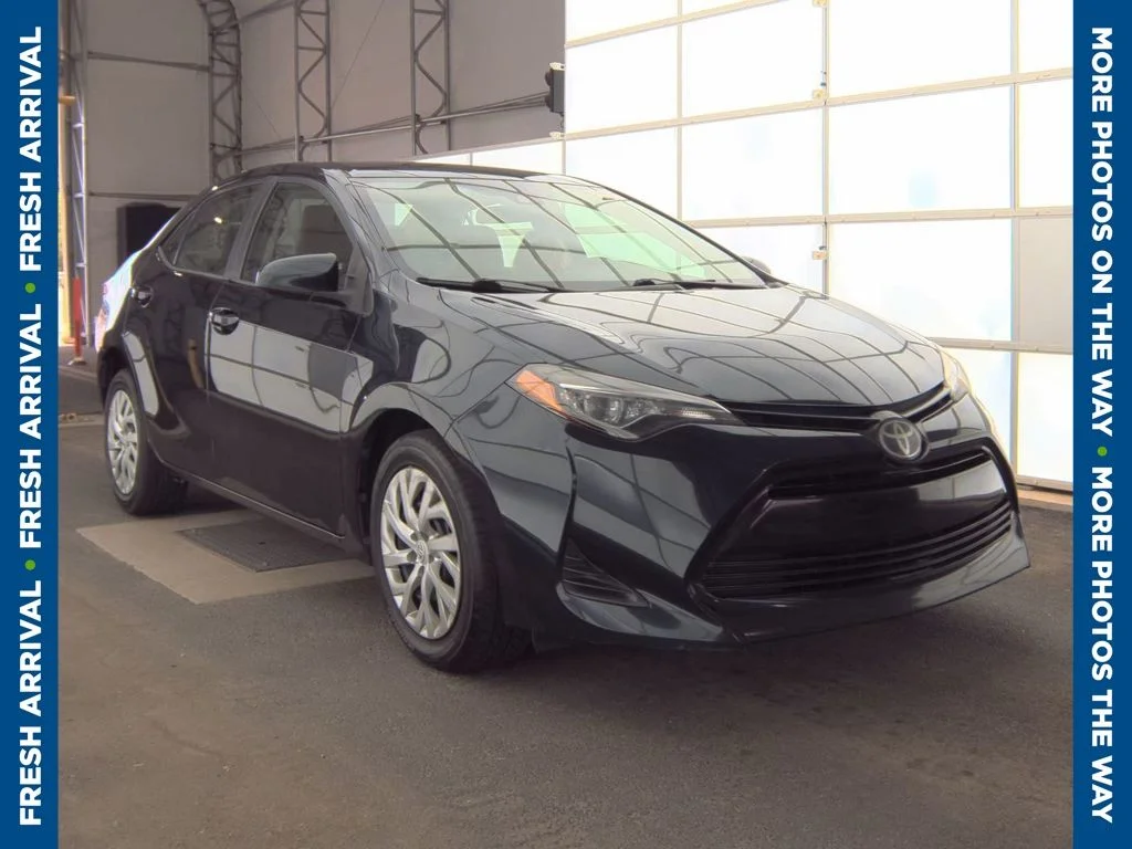 Used 2019 Blue Toyota LE image 1