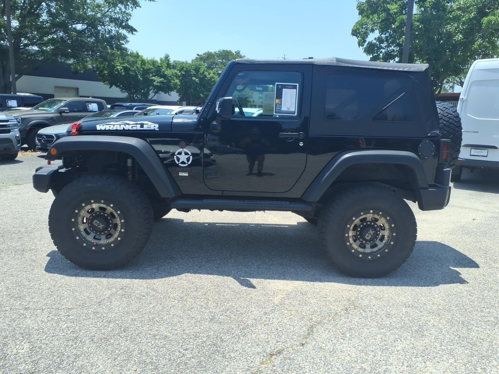 Used 2017 Black Clearcoat Jeep Sport image 9