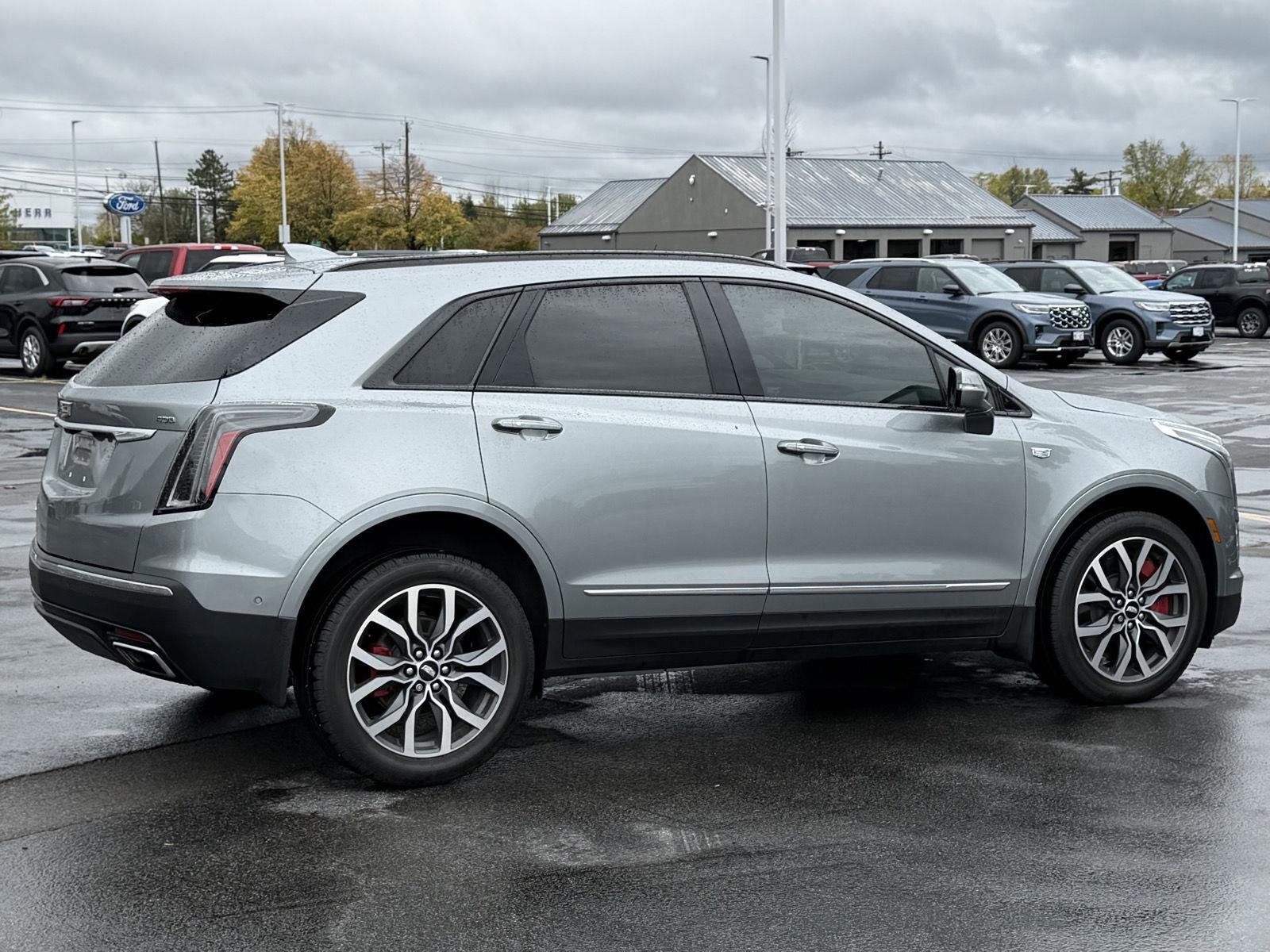 Used 2024 Argent Silver Metallic Cadillac AWD Sport image 6