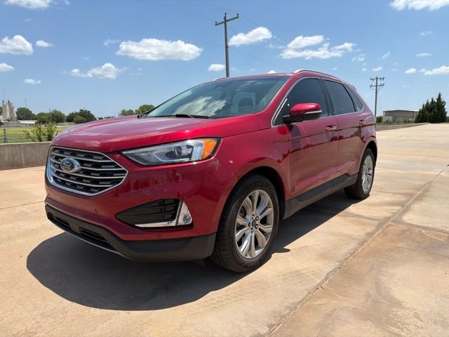 Used 2022 Red Ford Titanium image 1