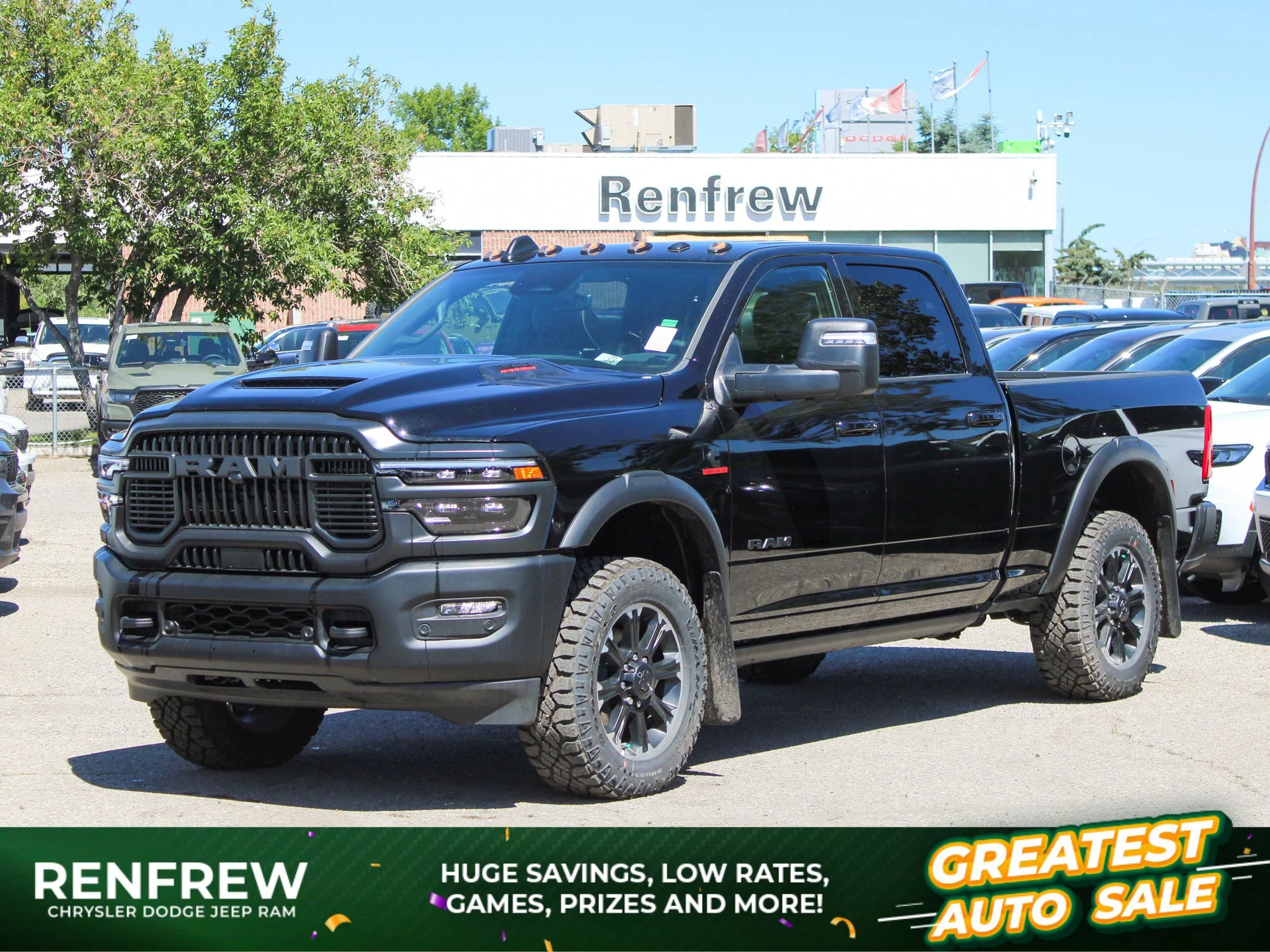 New 2026 Black RAM Rebel* Crew Cab 4x4, Sunroof, 34 Inch A/T Tires, Passenger Screen image 1