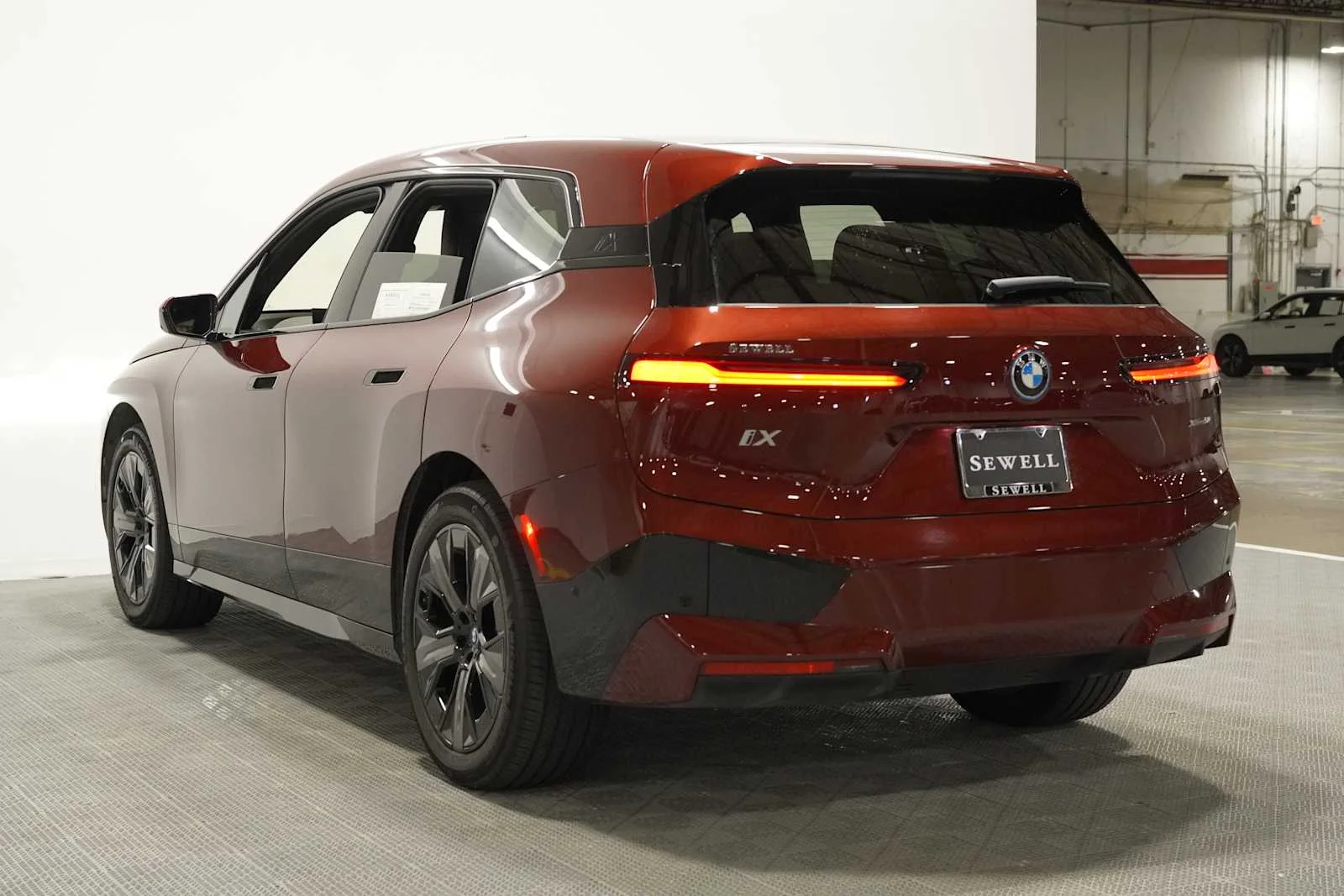 Certified Used 2024 Aventurin Red Metallic BMW xDrive50 image 6