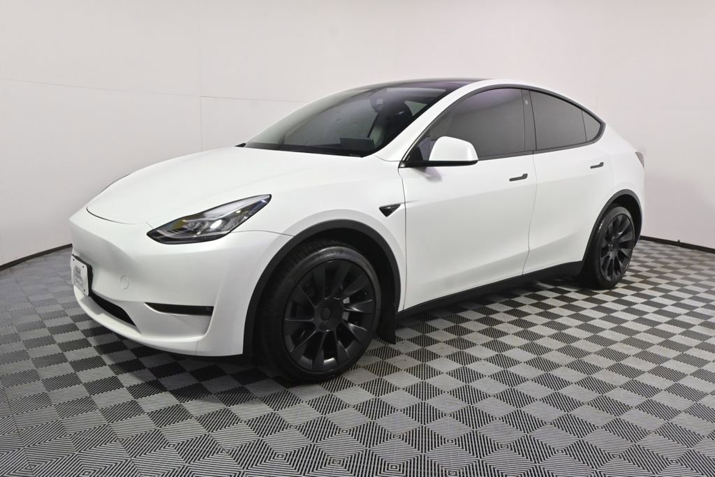 Used 2023 Tesla Model Y Long Range with VIN 7SAYGDEE2PA036228 for sale in Minneapolis, Minnesota