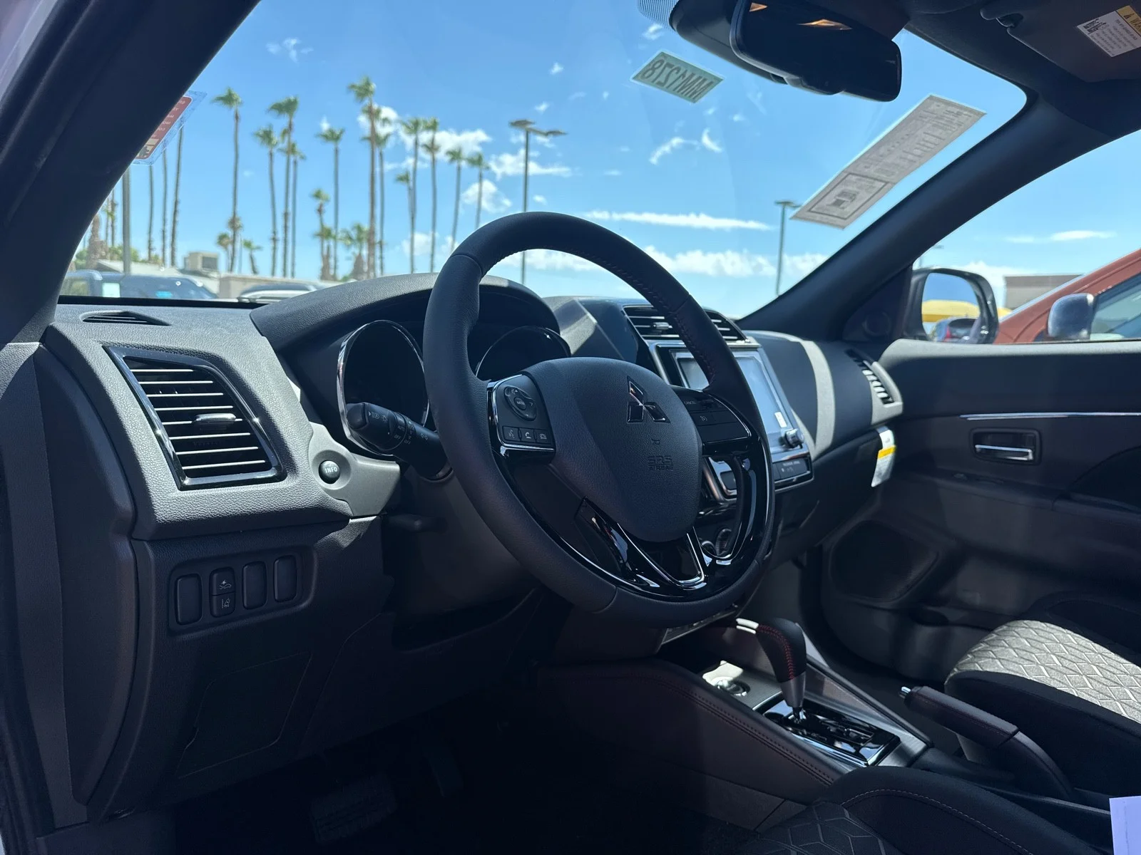 Used 2025 White Diamond Mitsubishi Trail Edition image 13