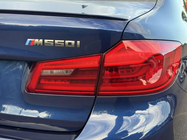 Used 2019 Blue BMW M550i xDrive image 14