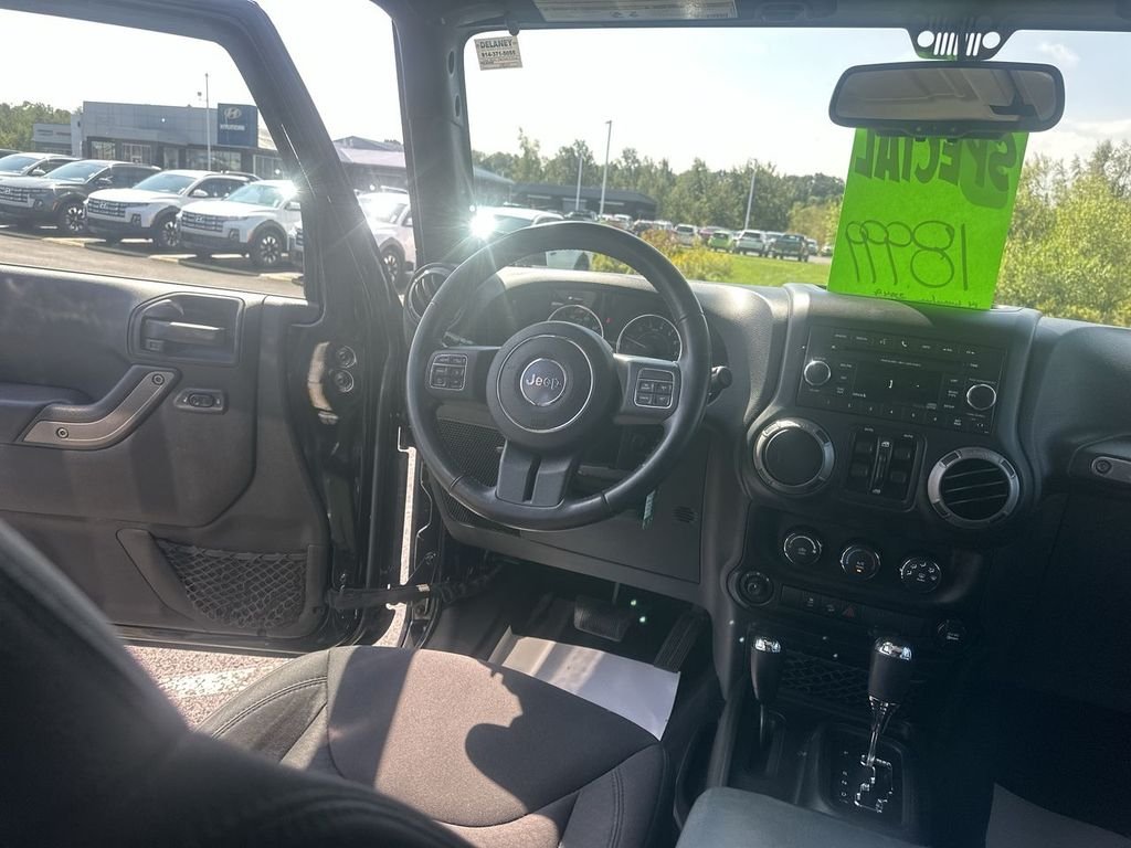 Used 2014 Black Jeep Unlimited Sport image 15