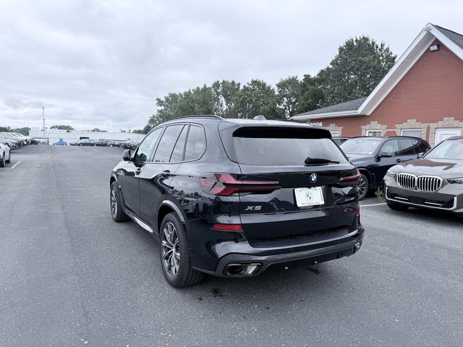 Used 2024 Carbon Black Metallic BMW xDrive40i image 5