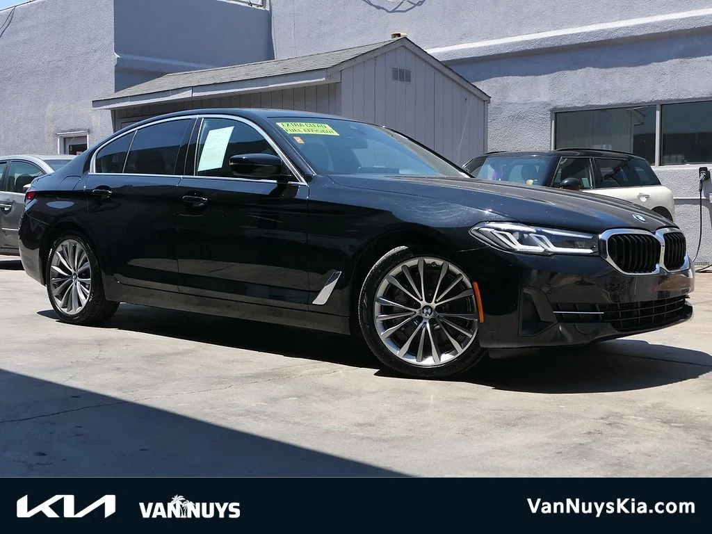 Used 2023 Black BMW 530i image 1
