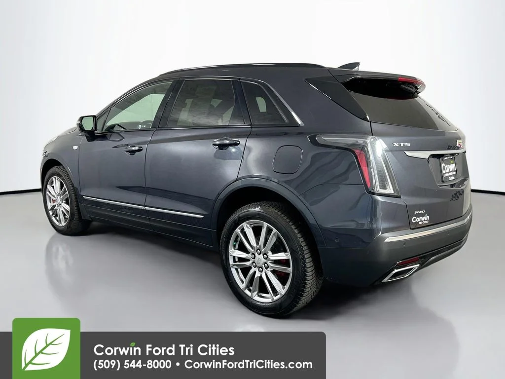Used 2023 Stellar Black Metallic Cadillac Sport image 11