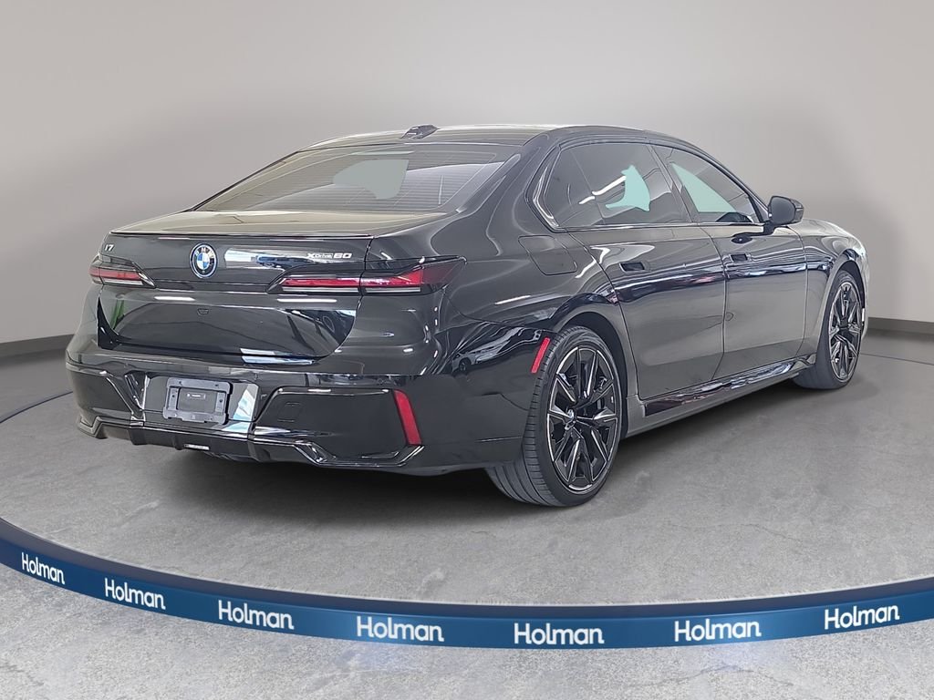 Used 2023 Black Sapphire Metallic BMW xDrive60 image 7