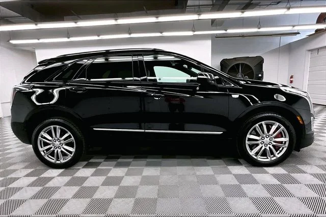 Used 2024 Stellar Black Metallic Cadillac Sport image 15