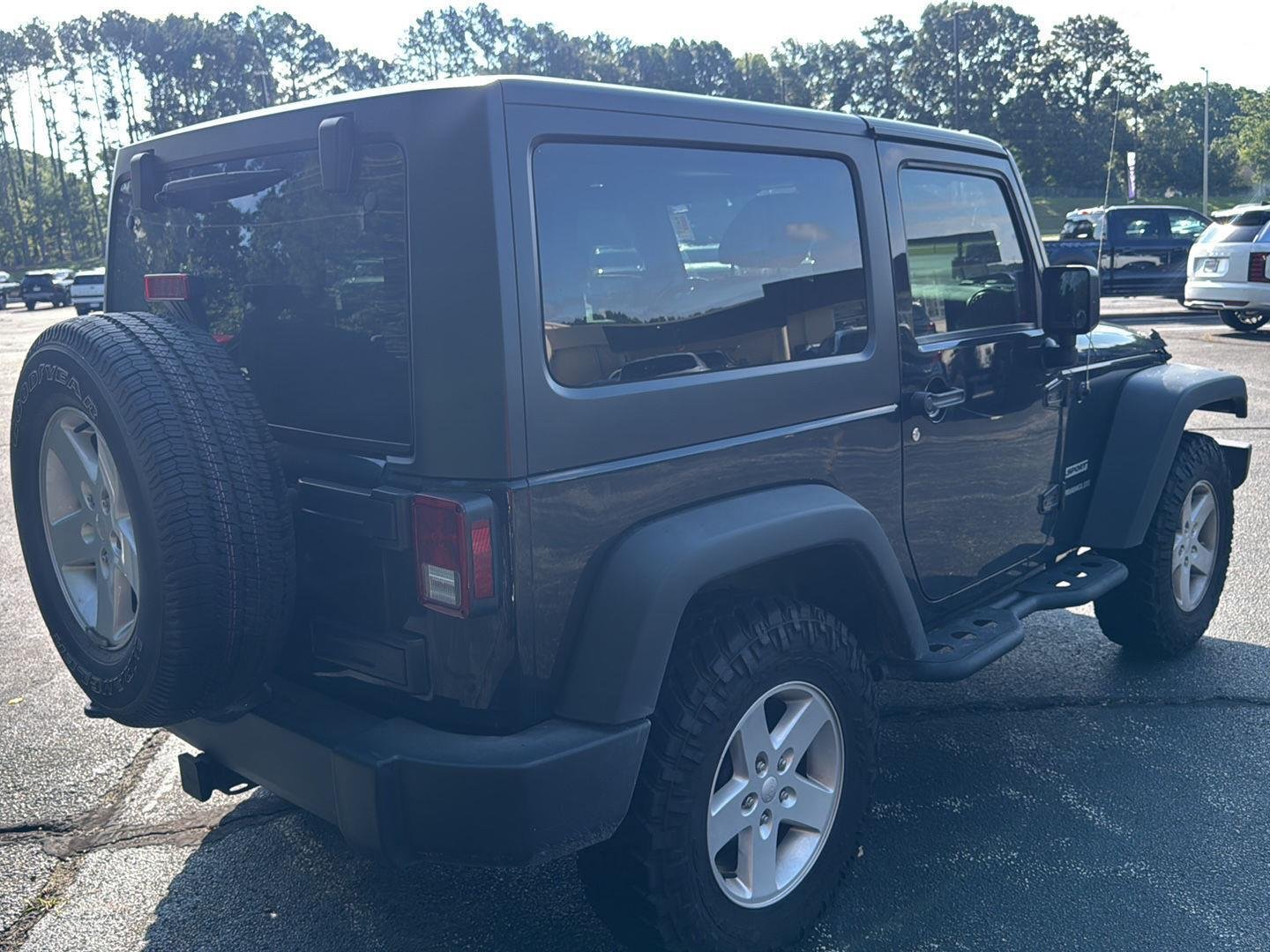Used 2016 Black Clearcoat Jeep Sport image 3