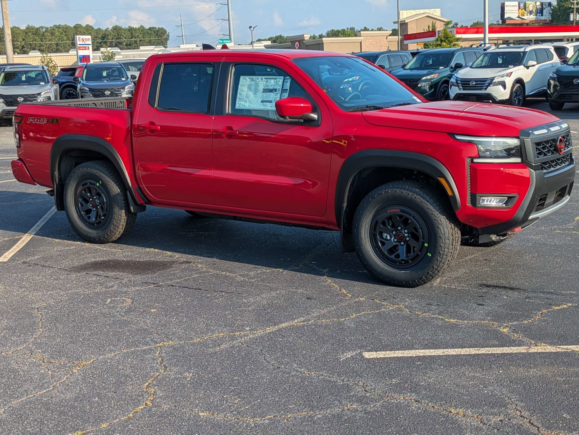 New 2026 Red Nissan PRO-4X image 1