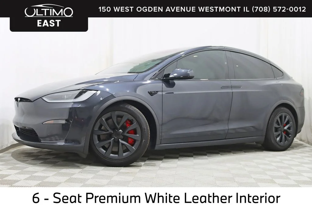 Used 2024 Black Tesla Plaid image 1