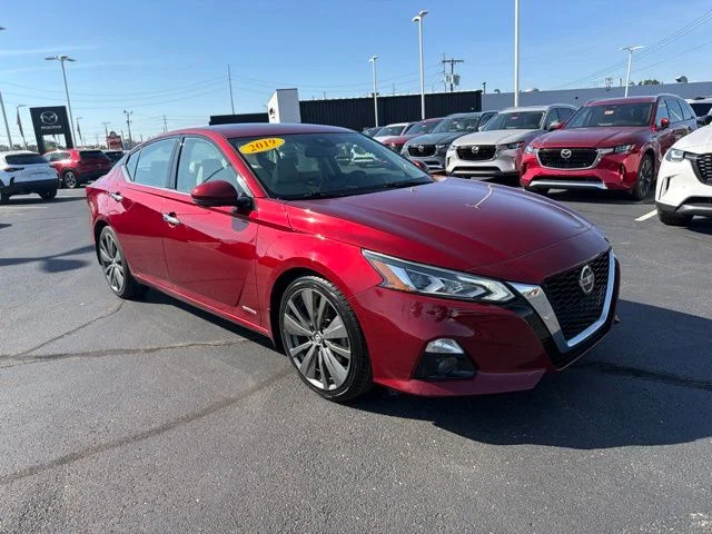 Used 2019 Red Nissan 2.0 Edition ONE image 1