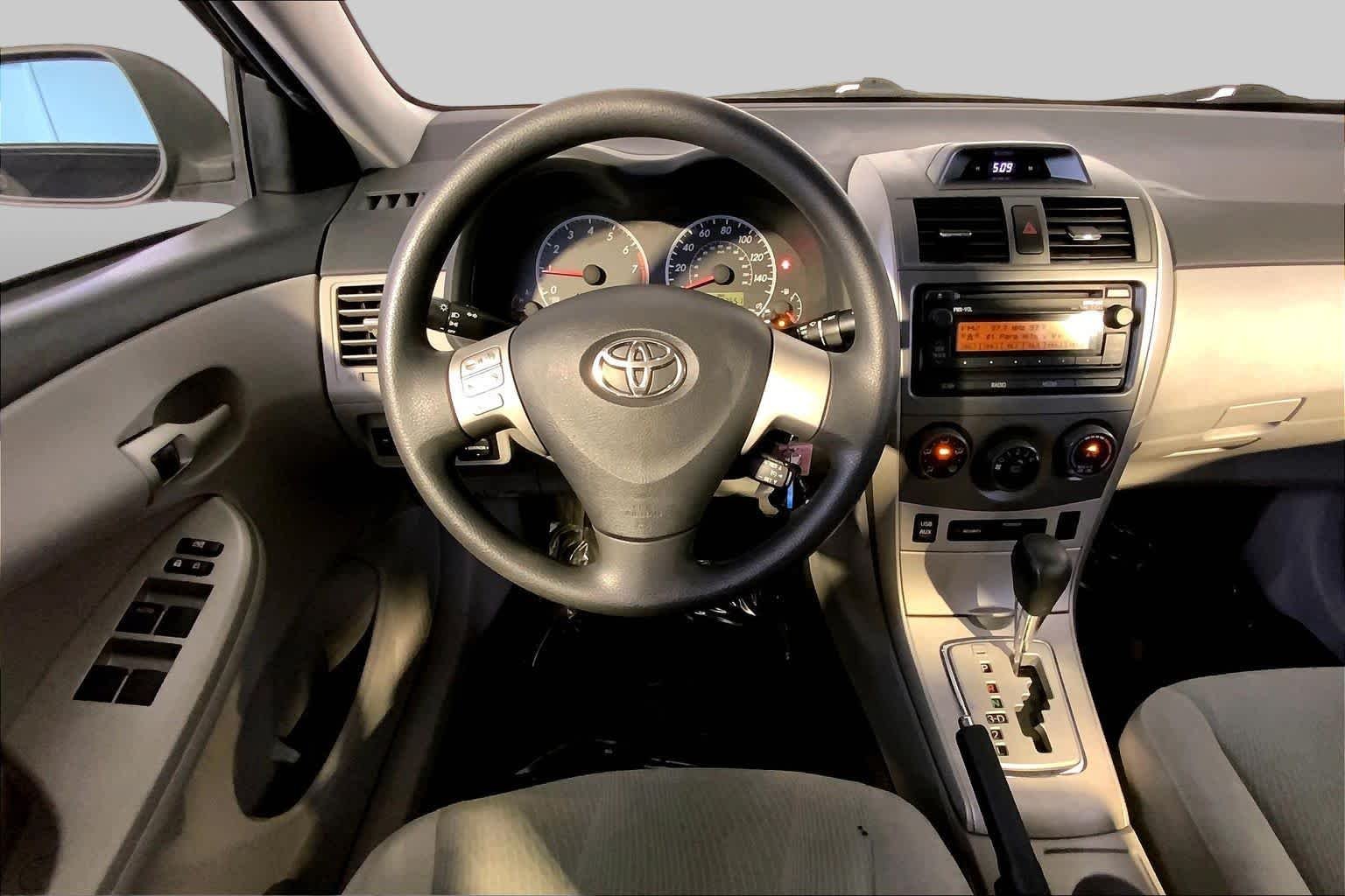 Used 2012 Black Sand Pearl Toyota LE image 5